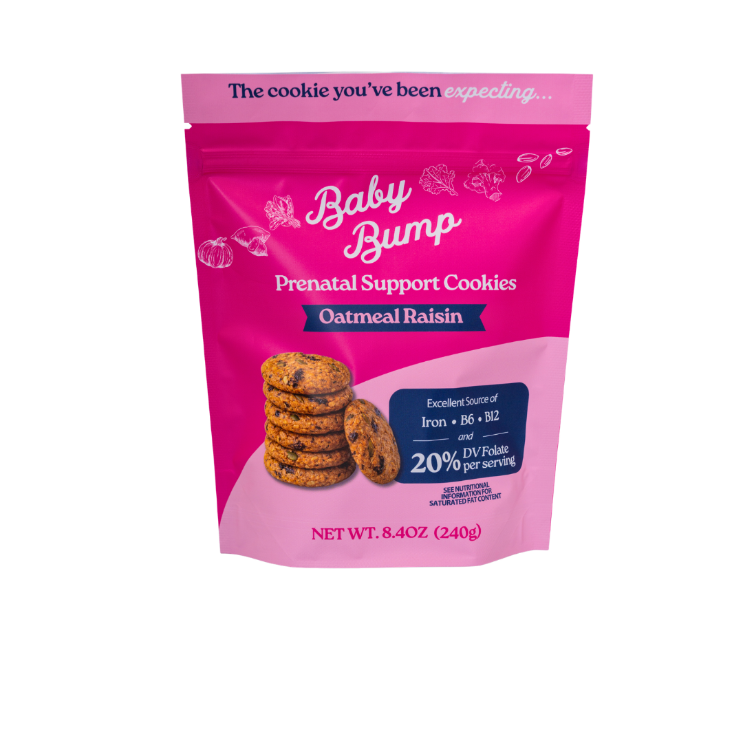 A stand-up pouch of Baby Bump Prenatal Support Cookies, Oatmeal Raisin flavor, on a plain white background. The packaging is bright pink with white and navy text and a photo of cookies on the front.